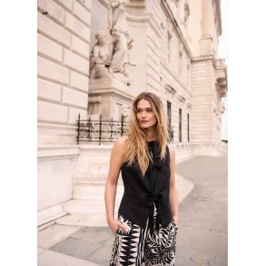 Vest med sljfelukning