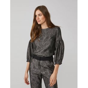 Bluse med glitter og pufrmer