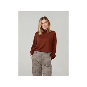 Bluse i fin uldblanding.