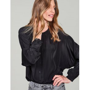 Bluse med flagermusrmer